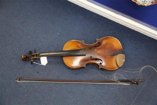 A decorative violin, bearing Gaspar da Salo label, body 14.5in., overall 23.5in., cased with a bow